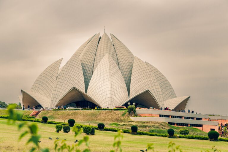 A beautiful shot of the Lotus Temple in Delhi India under a cloudy sky